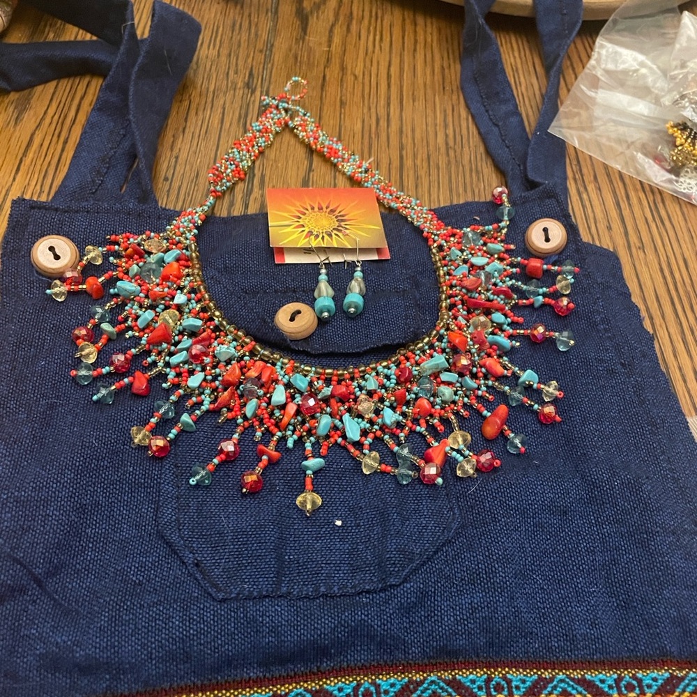 Colorful Beaded Necklace  and earrings . Handmade by me . Very intricate detail